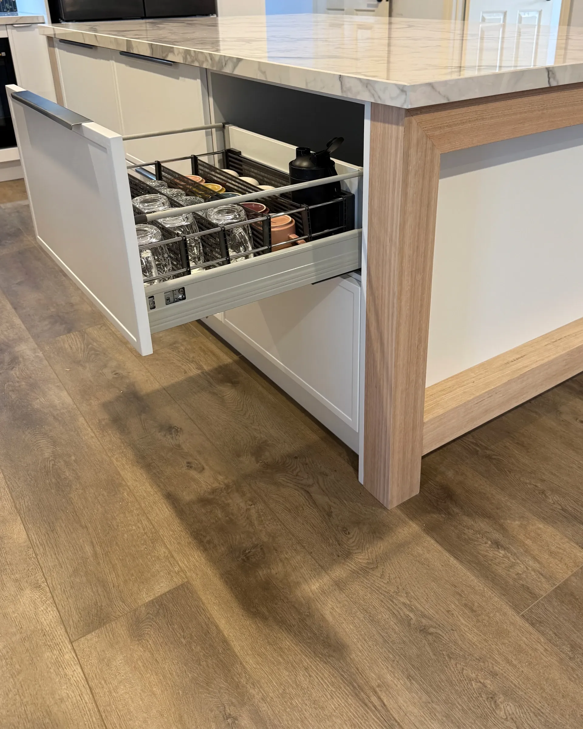 Integrated dishwasher drawer in the completed Point Cook kitchen island