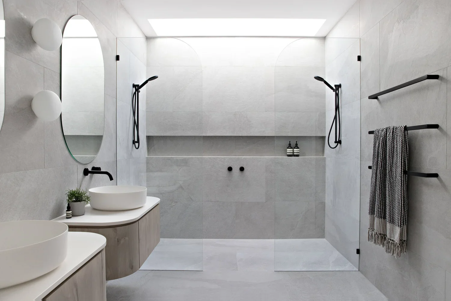 bathroom with twin basins and timber vanity