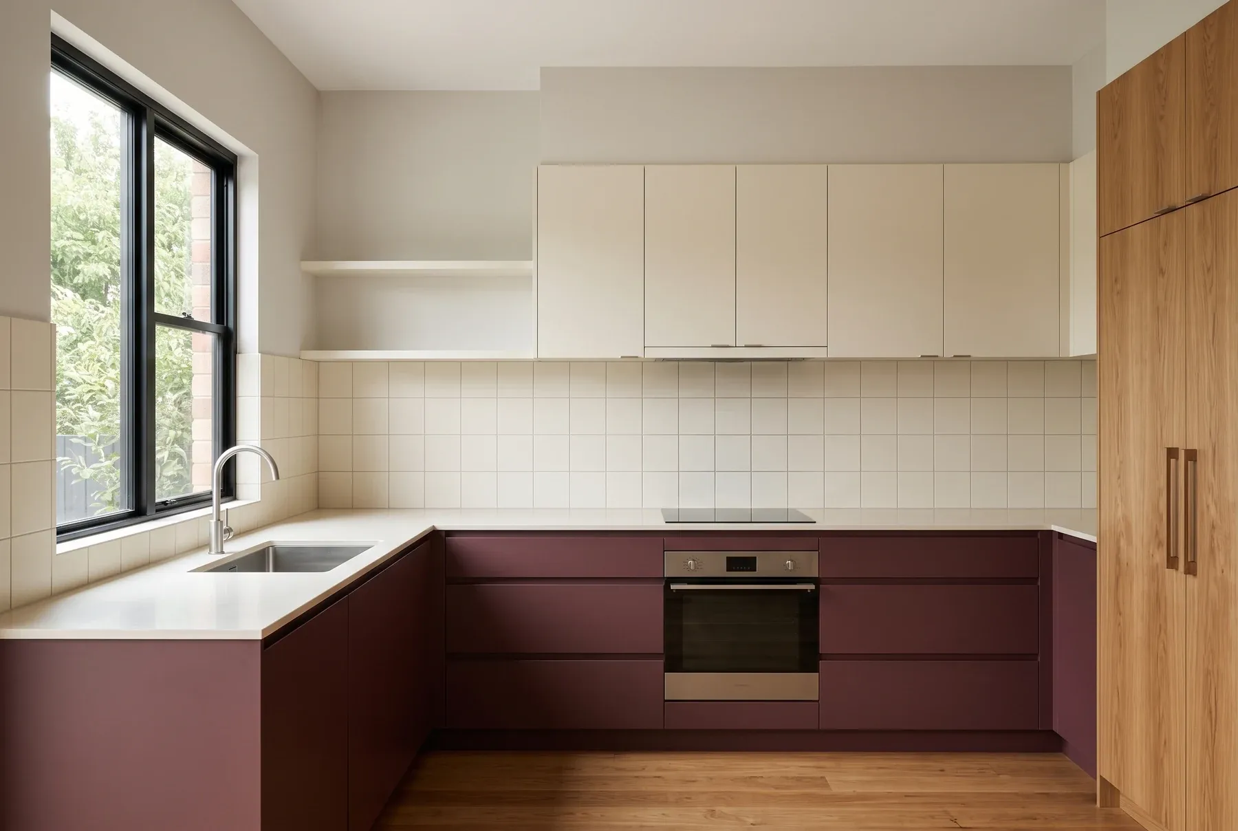 Kitchen inspiration with burgundy cabinetry, cream square tiles and an open L-shaped layout