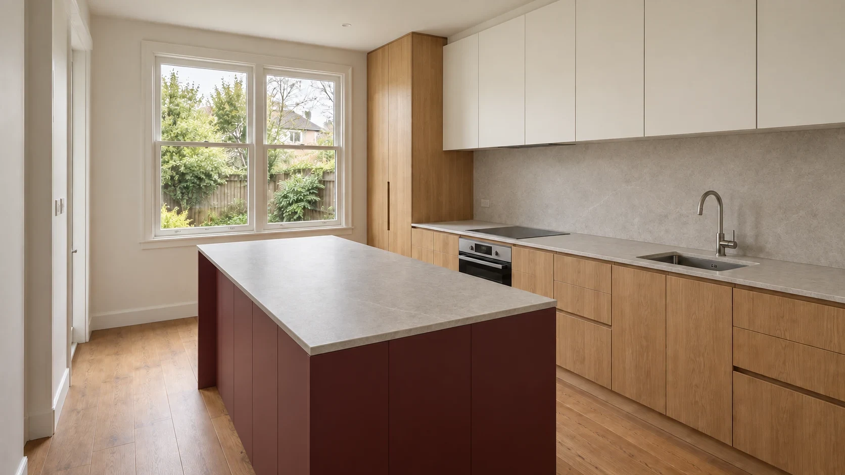 An oxblood island with natural oak