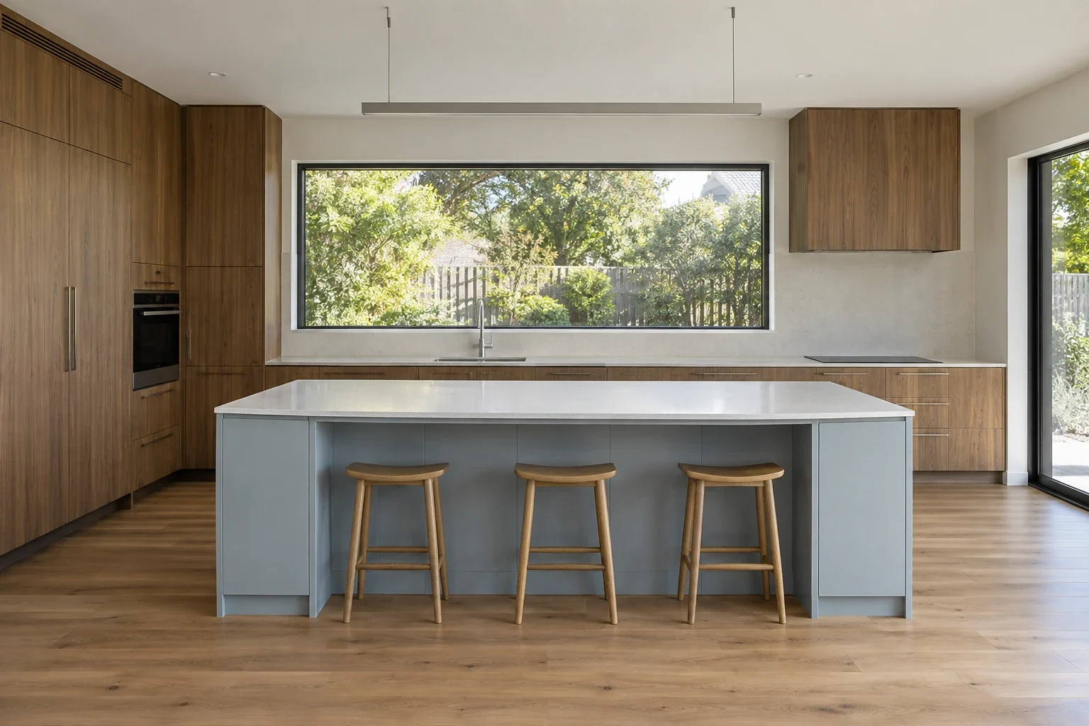 Walnut with a powder-blue island — kitchen design inspiration